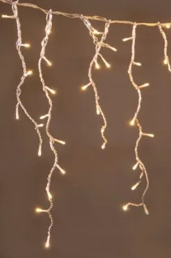 CTW Clear Cable 960 LED Snowing Icicle Light Set - Warm White W/ 64 Gutter Hooks